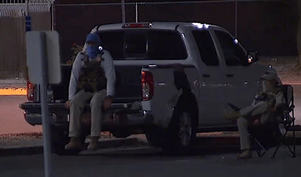 Armed vigilantes watching ballot drop boxes in Arizona