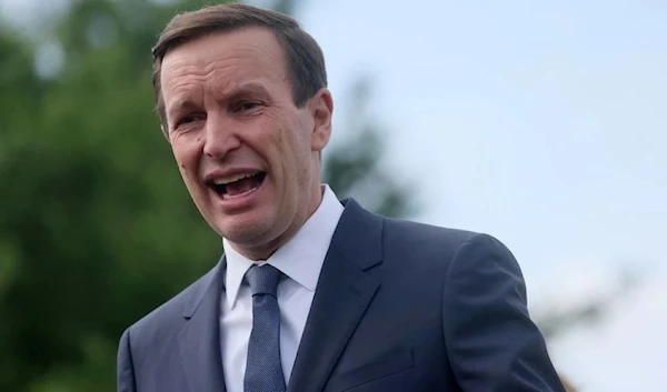 U.S. Sen. Chris Murphy (D-CT) speaks at an event opening a temporary memorial honoring 45,000 lives lost due to gun violence in 2020 on the National Mall near the Washington Monument in Washington, US, June 7, 2022. Source|: REUTERS/Leah Millis