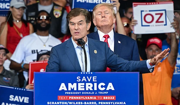 Candidate (R-PA) Mehmet Oz and former US President Donald Trump (AFP)