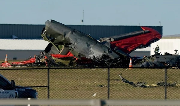 Debris was scattered across Dallas Executive Airport after the crash. (AP)