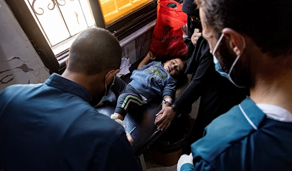 Medics treat a child diagnosed with cholera in a hospital in Deir el-Zour, Syria, Thursday, Sept. 29, 2022 (AP Photo/Baderkhan Ahmad)