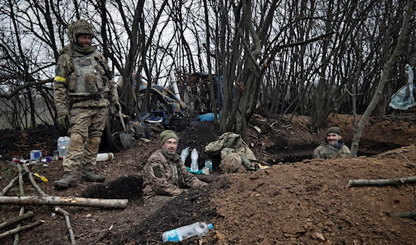 Ukrainian Army soldiers at an undisclosed location in Donetsk, Wednesday, Nov. 16, 2022 (AP Photo/Roman Chop)