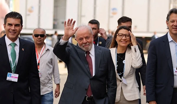 Lula is greeted like a rock star at the COP27. (Reuters)