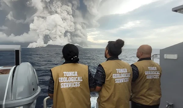 Geologist observing as the volcano erupted (Tonga Geological Services)