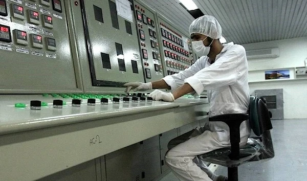 =An Iranian scientist at Fordow nuclear facility. (AP)