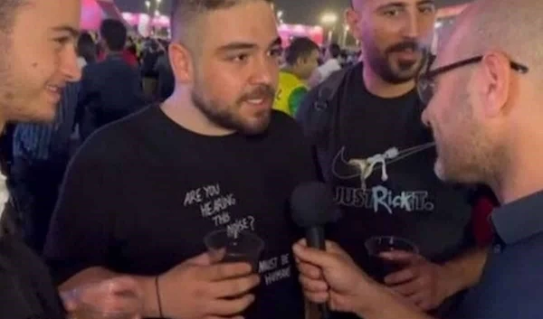 A Lebanese young man appears in the picture talking to the Israeli reporter, right before he learned about his identity.