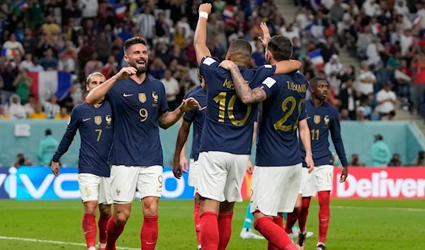 France's Olivier Giroud, second left, celebrates after scoring his side's fourth goal during the World Cup group D soccer match between France and Australia, at the Al Janoub Stadium in Al Wakrah, Qatar, Tuesday, November 22, 2022 (AP Photo)