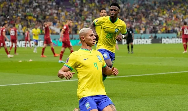 Brazil's Richarlison celebrates after scoring his side's second goal at the Lusail Stadium in Lusail, Qatar, Thursday, Nov. 24, 2022 (AP Photo)