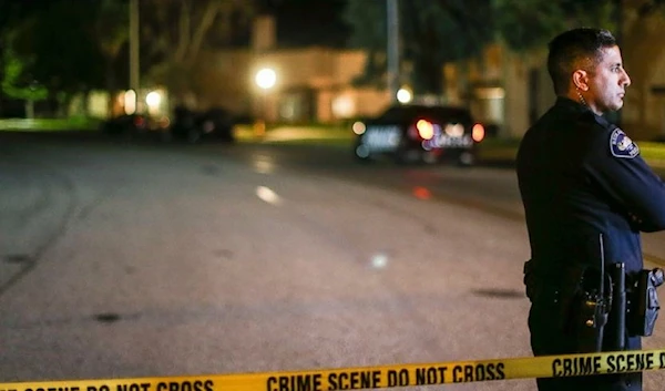 Police at a murder scene (AP)