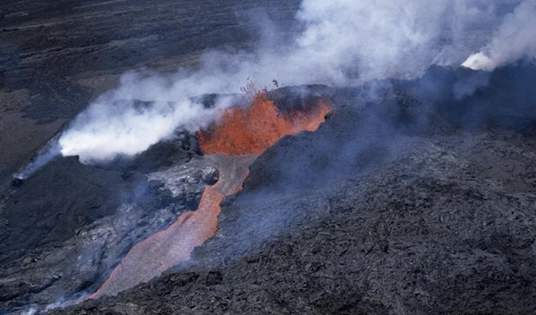 Molten rock flows from Mauna Loa, located on the south-central part of the island of Hawaii, on April 4, 1984. (AP Photo/File)