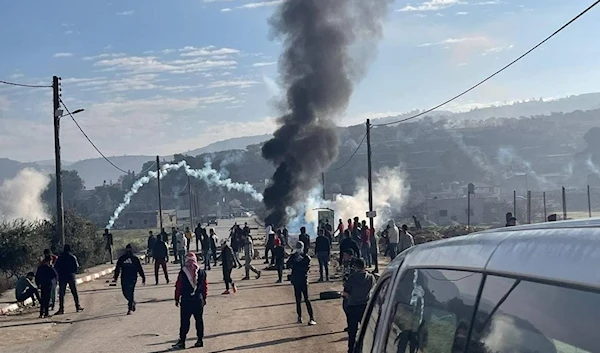 Palestinians during confrontations in the occupied West Bank, occupied Palestine