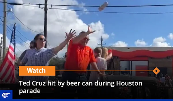 Ted Cruz hit by beer can during Houston parade