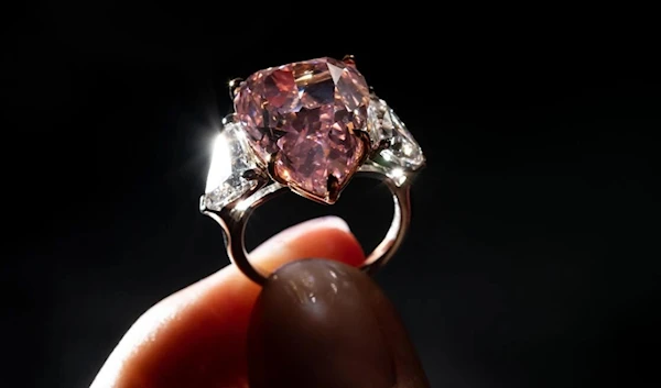 At 18.18 carats, the gem is the largest pear-shaped 'fancy vivid pink' diamond ever sold under the hammer (AFP)