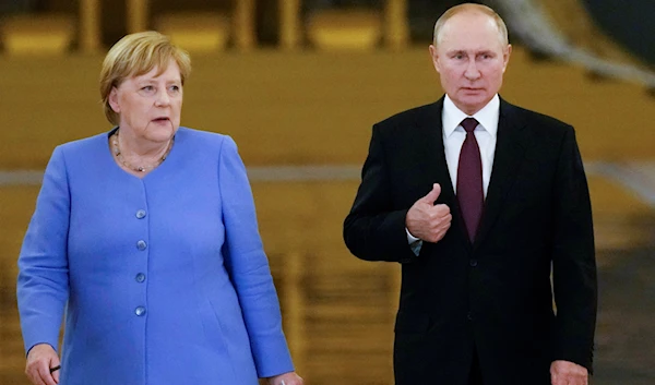 Russian President Vladimir Putin and former German chancellor Angela Merkel (Getty Images)