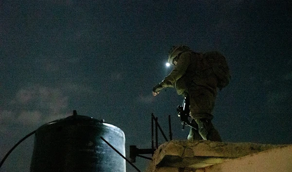 A soldier in the Israeli occupation forces in the occupied West Bank, occupied Palestine, December 8, 2022