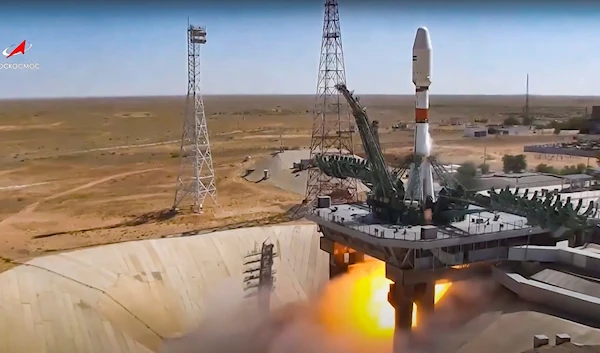 Illustrative: In this handout photo taken from video released by Roscosmos on August 9, 2022, a Russian Soyuz rocket lifts off to carry Iranian Khayyam satellite into orbit Baikonur, Kazakhstan (AP Photo)