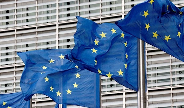 European Union flags flutter outside the EU Commission headquarters in Belgium. (REUTERS)