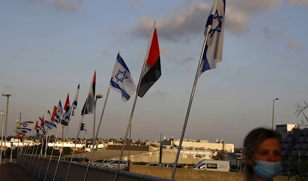 Israeli illegal settlement in Umm Khalid, accompanied by Israeli and Emirati flags in August, 2020. (AP)