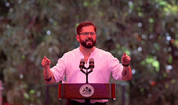 Chilean President Gabriel Boric gives a speech during a cultural event in Santiago, Chile, March 13, 2022 (Reuters)