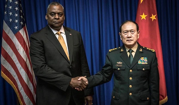 U.S. Secretary of Defense Lloyd Austin with China’s Defense Minister Gen. Wei Fenghe on Nov. 22 (Radio Free Asia)