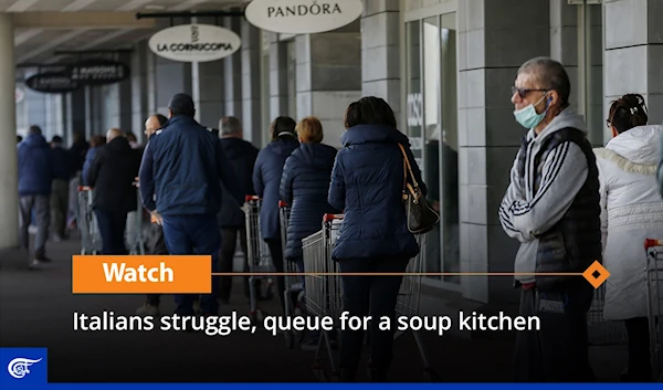 Italians struggle, queue for a soup kitchen