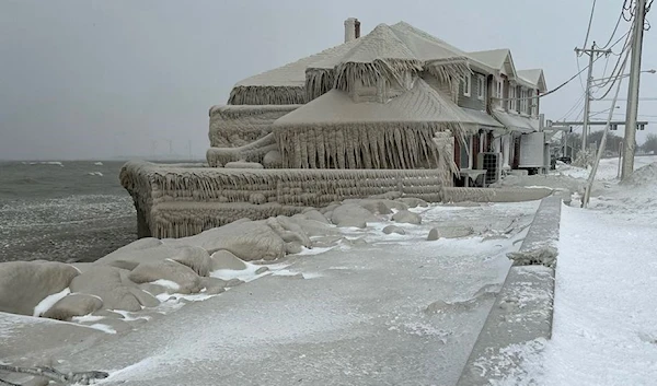 Hoak's restaurant is covered in ice from the spray of Lake Erie waves during a winter storm that hit the Buffalo, New York (Reuters)