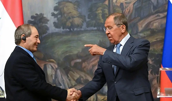 Syrian Foreign Minister Faisal Mekdad and Russian Foreign Minister Sergey Lavrov