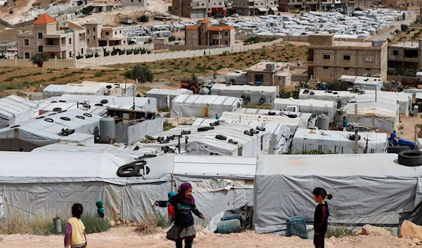 File photo of a Syrian refugee camp in the border town of Arsal, eastern Lebanon (AP)