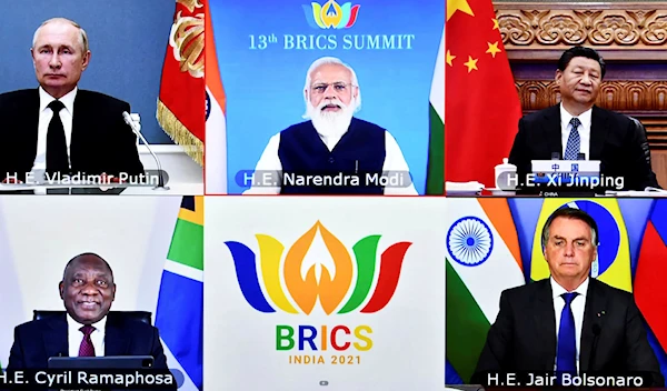 This handout photograph provided by the Press Information Bureau shows leaders of the BRICS nations during a video conference, in New Delhi, India, Thursday, Sept. 9, 2021 (Press Information Bureau via AP)