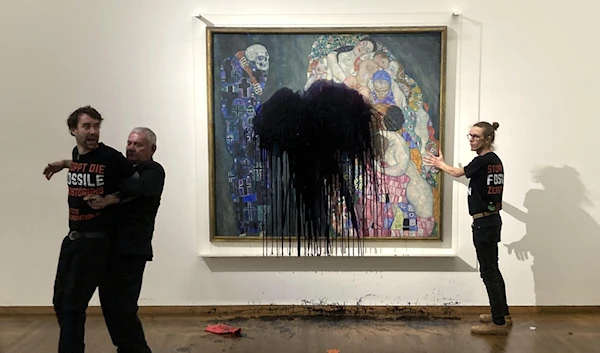 Activists throw liquid at a Gustav Klimt painting in Vienna (AP)