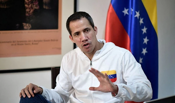 Venezuelan opposition leader Juan Guaido speaks during an interview with Reuters, in Caracas, Venezuela, December 6, 2022. REUTERS/Gaby Oraa