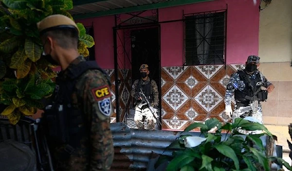 Police and soldiers patrol in Soyapango, El Salvador (AFP)