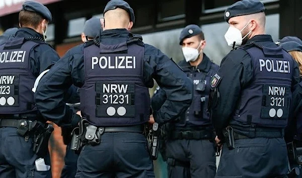 German police are conducting searches in more than 130 homes. (Reuters)