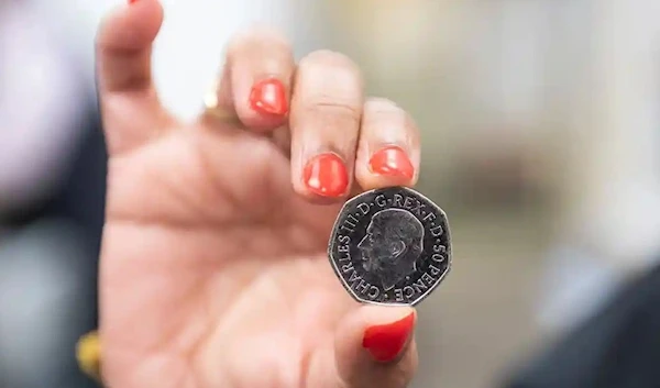 King Charles III appears facing left, the opposite direction to the late Queen’s portrait on coins. (The Royal Mint/PA)