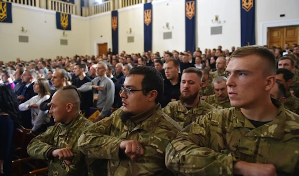 Azov Battalion members in 2016 (AFP)