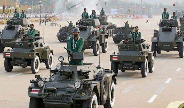 Military personnel participate in a parade on Armed Forces Day in Naypyitaw, Myanmar, March 27 (Reuters)