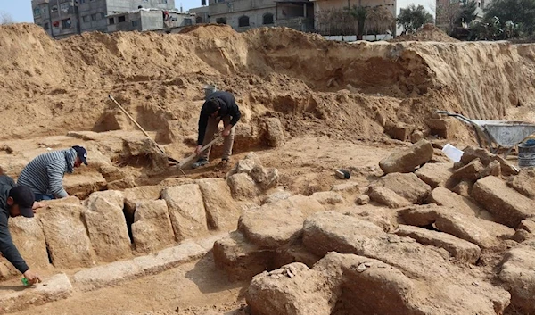 Men working in the newly discovered Roman cemetery in Gaza (Reuters)