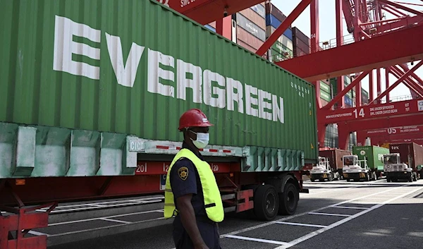 uthorities transport containers of garbage to be returned to Britain after authorities refused to process the illegally imported hazardous cargo, in Colombo on February 21, 2022. (Photo by Ishara S. KODIKARA / AFP)