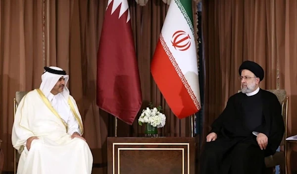 The emir of Qatar and the Iranian president in Doha, Qatar.