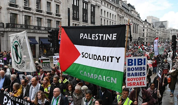 A march calling for justice for Palestinians moves through the streets of central London. (AFP)