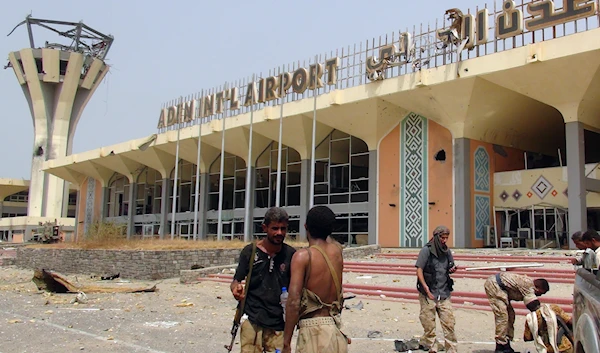 Saudi-led coalition-backed forces in front of Aden International Airport (AFP)