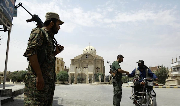 Members of the Kurdish police known as the Asayesh, northeastern Syrian city of Hasakah (AFP)