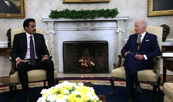 Qatari Emir Tamim bin Hamad Al-Thani meets US President Joe Biden in the White House on January 31, 2022 (Reuters)