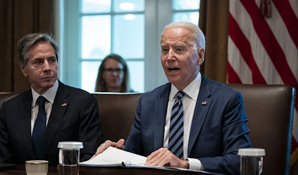 Secretary of State Antony Blinken listens as President Biden speaks at a cabinet meeting at the White House, July 20. (Bloomberg)