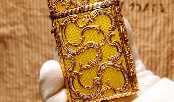 A Faberge jeweled gold and enamel cigarette case and dating from 1899-1903, at Sotheby's auction house in London