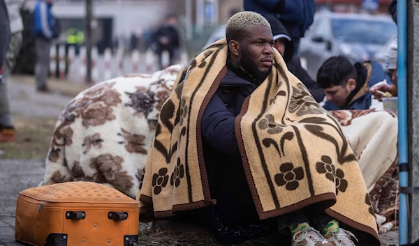 Refugees from Africa, Middle East and India seen at the Medyka pedestrian border crossing in Poland fleeing the conflict in Ukraine, on Feb. 27, 2022