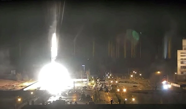 Surveillance camera footage shows a flare landing at the Zaporizhzhia nuclear power plant