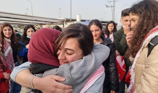 21-year old Palestinian female prisoner in her mother's arms