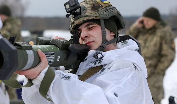 A Ukrainian service member learns to use a M141 Bunker Defeat Munition weapon supplied by US. (Reuters)