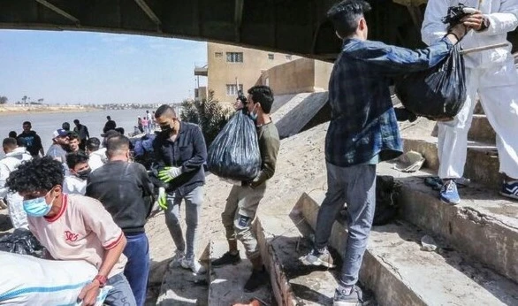 Iraqis clean up river as first green projects take root